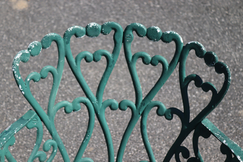 Four Vintage Cast Aluminum Outdoor Chairs