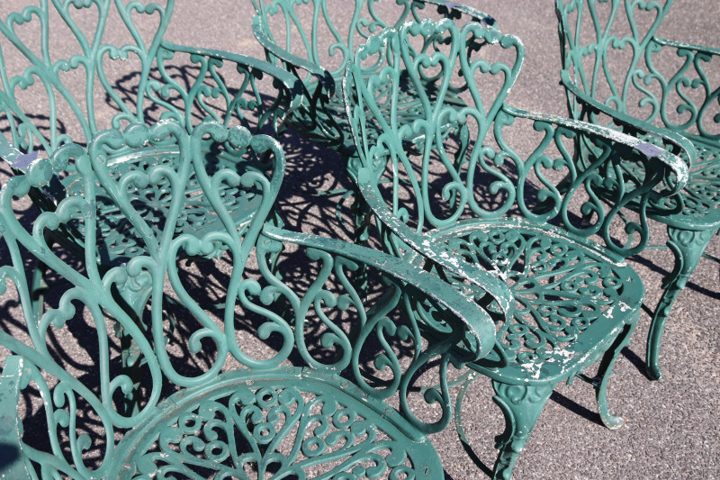 Seven Vintage Cast Aluminum Outdoor Chairs