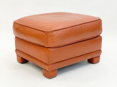 Leather club chairs and ottoman in the style of Ralph Lauren