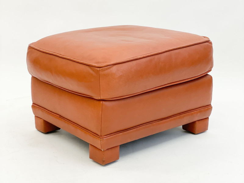 Leather club chairs and ottoman in the style of Ralph Lauren