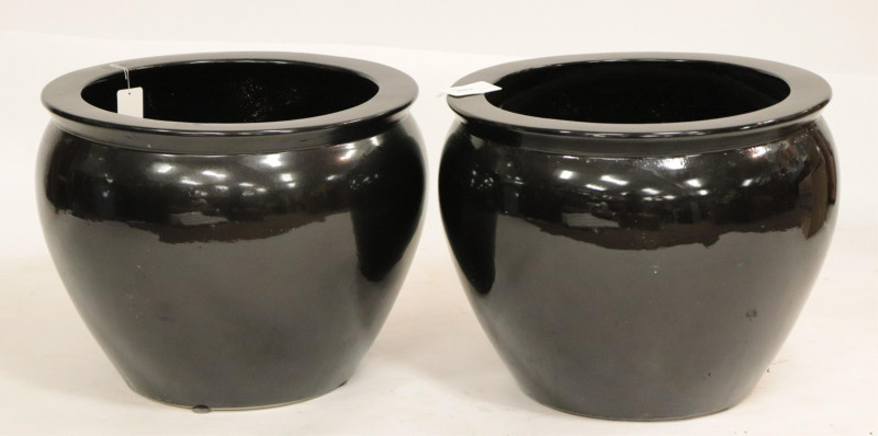 Near Pair of Black Ceramic Planters