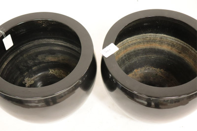 Near Pair of Black Ceramic Planters