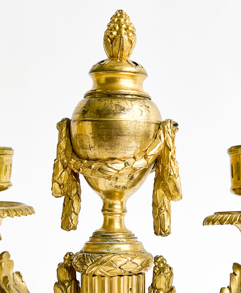 Pair of Louis XVI Gilt-Bronze Candelabra, in the manner of Jean-Charles Delafosse