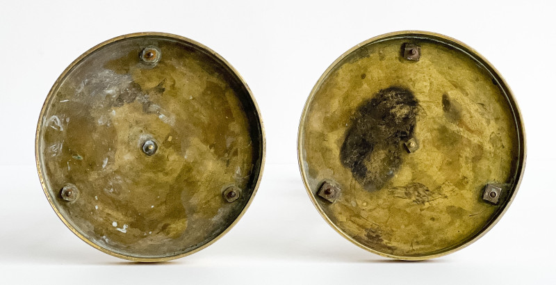 Pair of French Directoire Gilt-Bronze Candlesticks, after a model attributed to Claude Galle