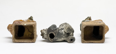 Pair of Chinese Glazed Ceramic Buddhist Lions and a Small Lion