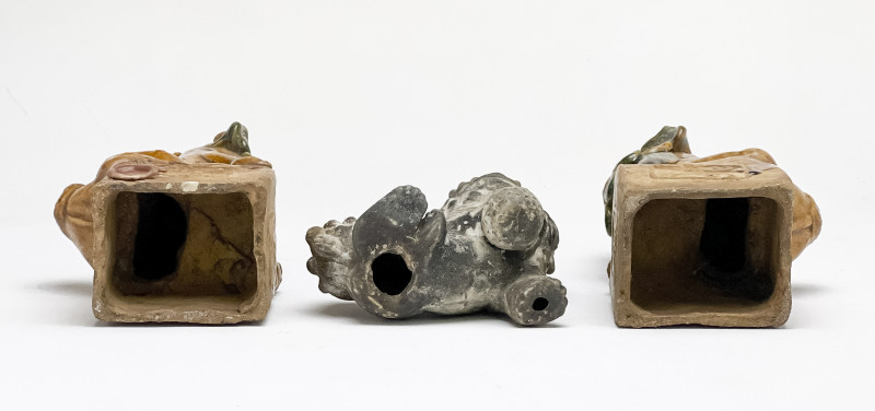 Pair of Chinese Glazed Ceramic Buddhist Lions and a Small Lion