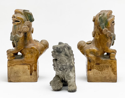 Pair of Chinese Glazed Ceramic Buddhist Lions and a Small Lion