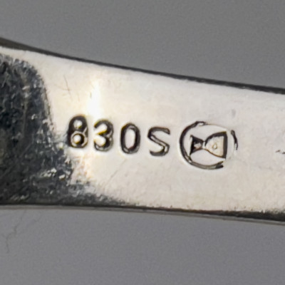 Cartier and Others - Sterling and Coin Silver Spoons, Pitcher, and Andirons