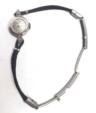 Gold and Diamond Bulova Watch and Gold, Onyx and Diamond Ring