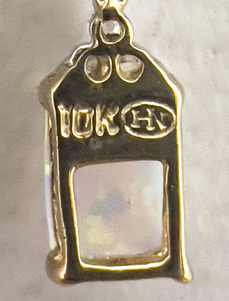 Gold Opal Earrings, Opal and Diamond Ring, and Cameo Pendant