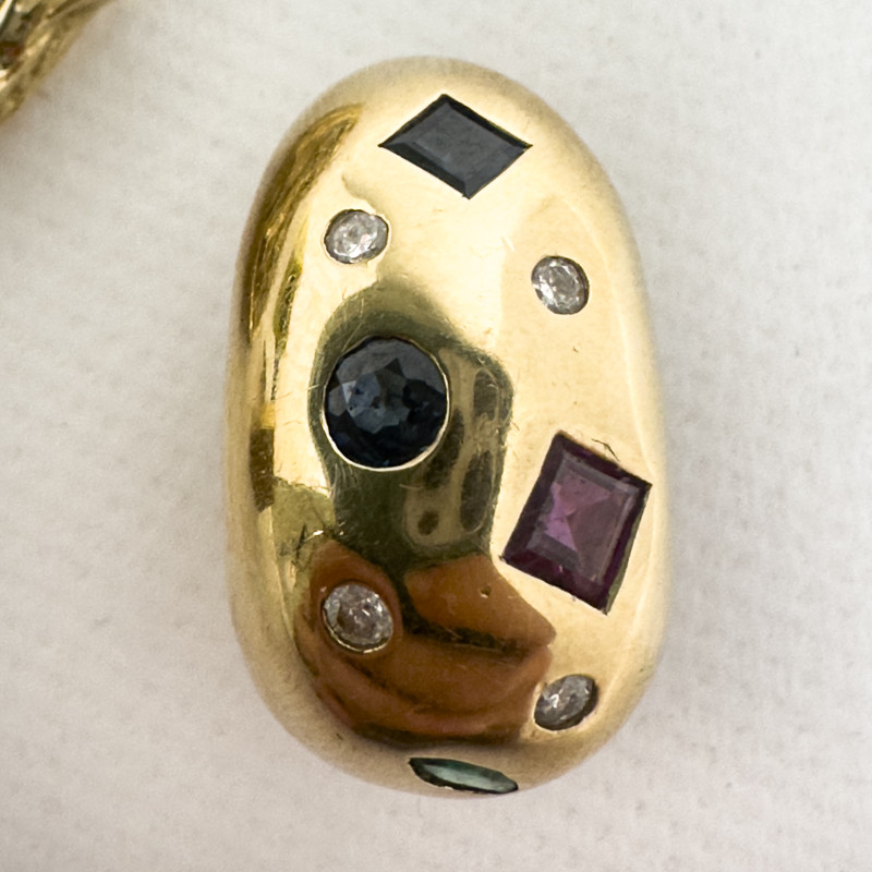 Gold Pendant, Cufflink, and Earring