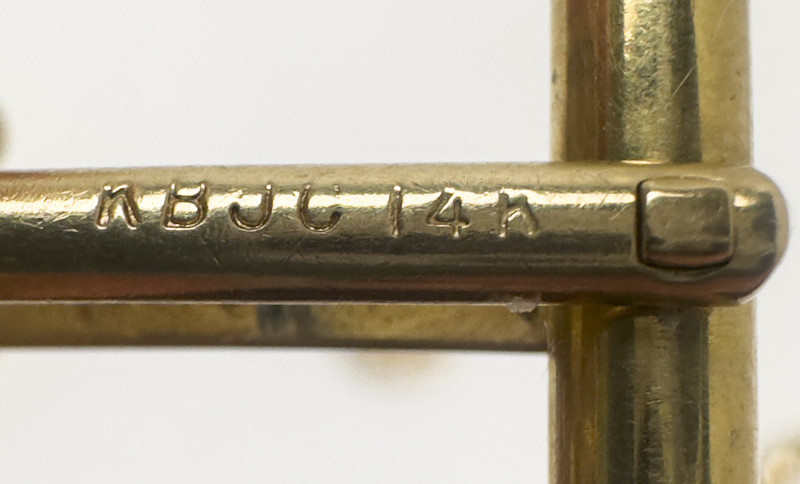 Gold Pendant, Cufflink, and Earring