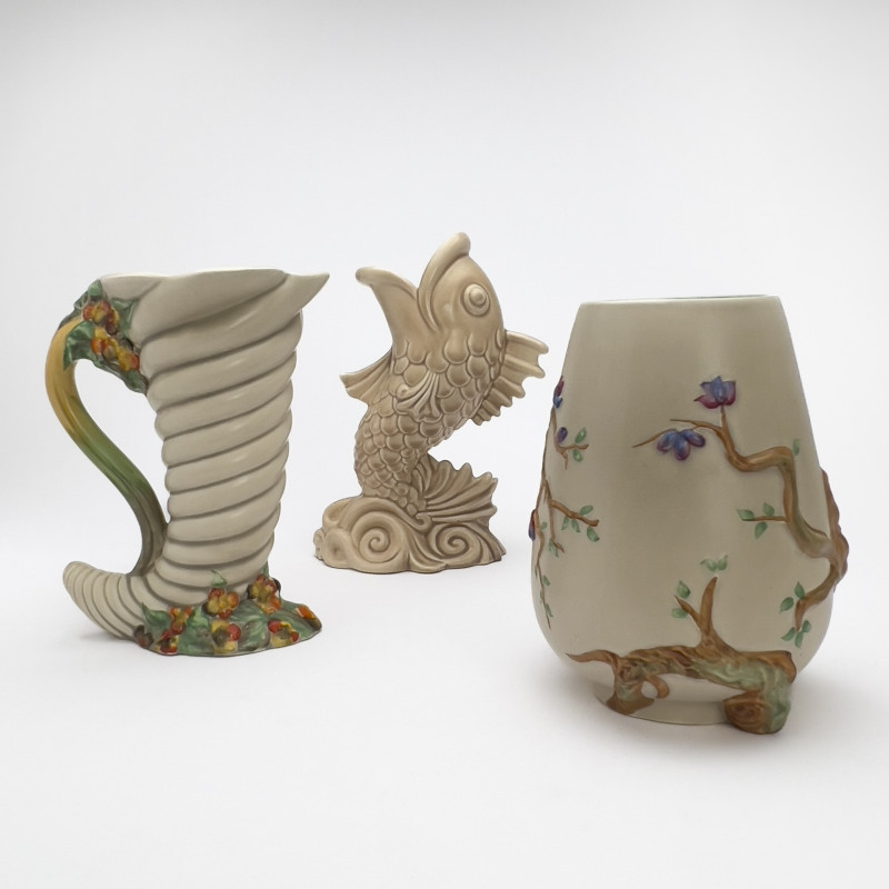 Clarice Cliff - Ceramic Vessels in Various Patterns, Group of 7