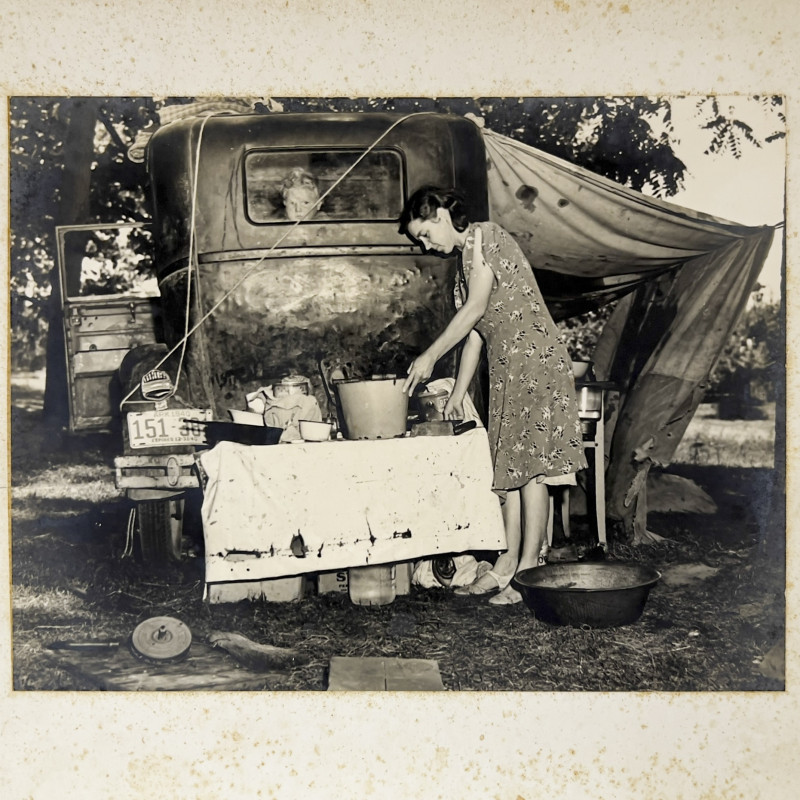 Dorothea Lange - Migrant Family: Wife of Migrant Worker from Arkansas Preparing a Meal