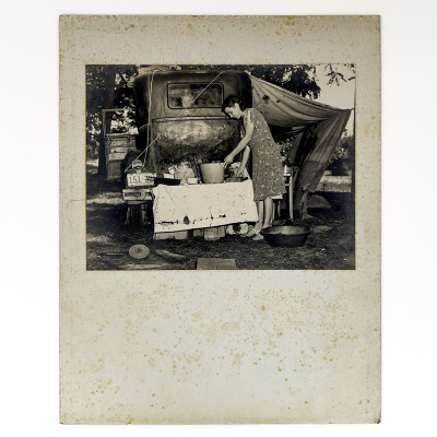 Dorothea Lange - Migrant Family: Wife of Migrant Worker from Arkansas Preparing a Meal