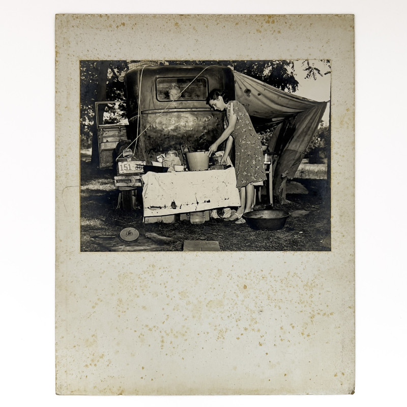 Dorothea Lange - Migrant Family: Wife of Migrant Worker from Arkansas Preparing a Meal