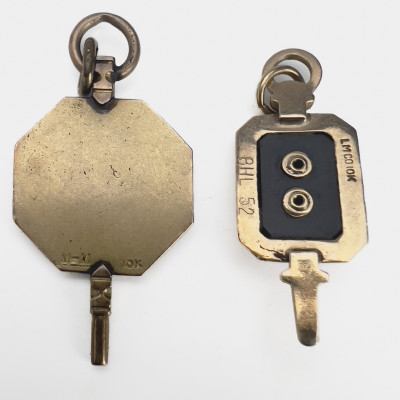 Two Gold New York High School Charms