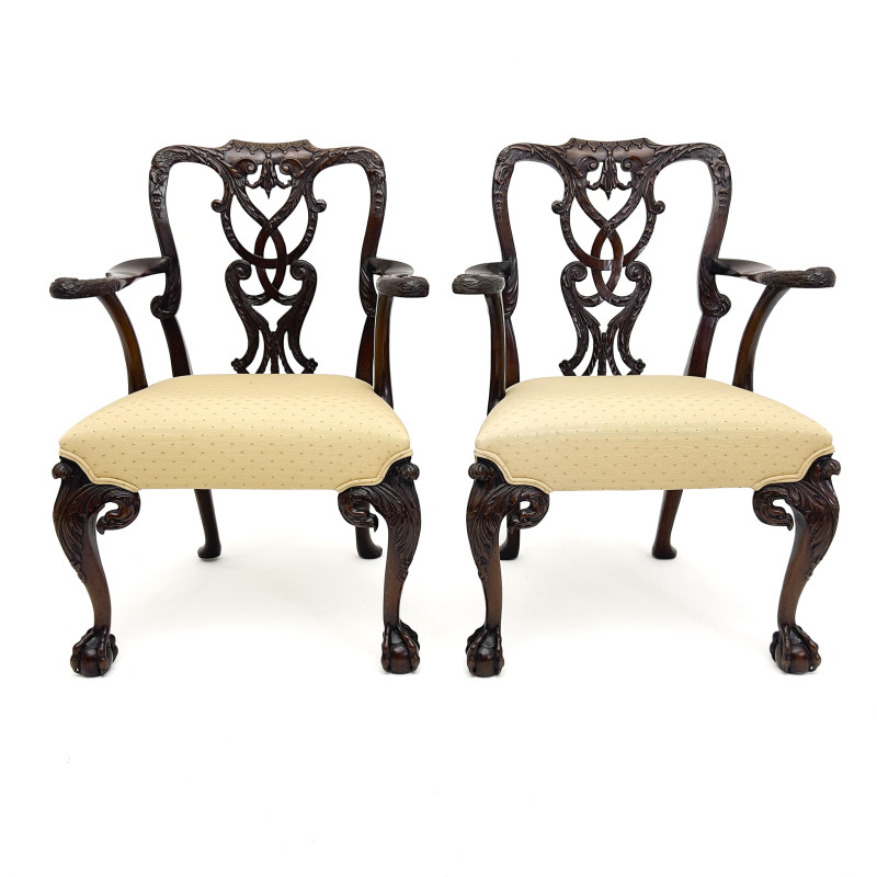 A Pair of Chippendale Style Carved Armchairs