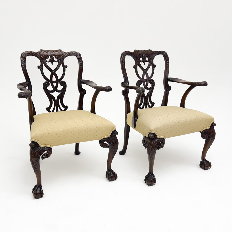 A Pair of Chippendale Style Carved Armchairs