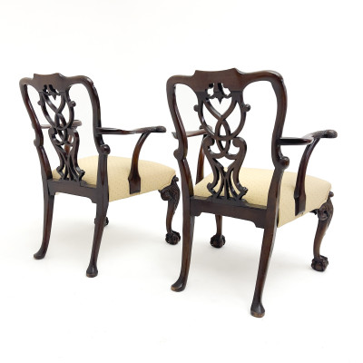 A Pair of Chippendale Style Carved Armchairs