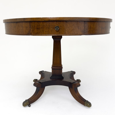 An Antique Regency Style Drum Table