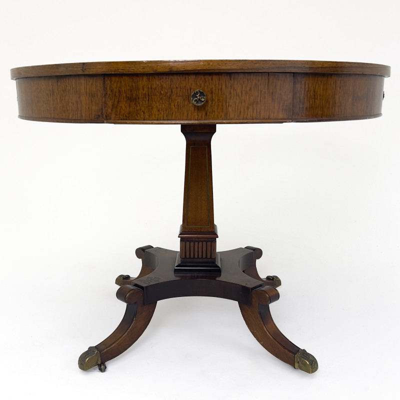 An Antique Regency Style Drum Table