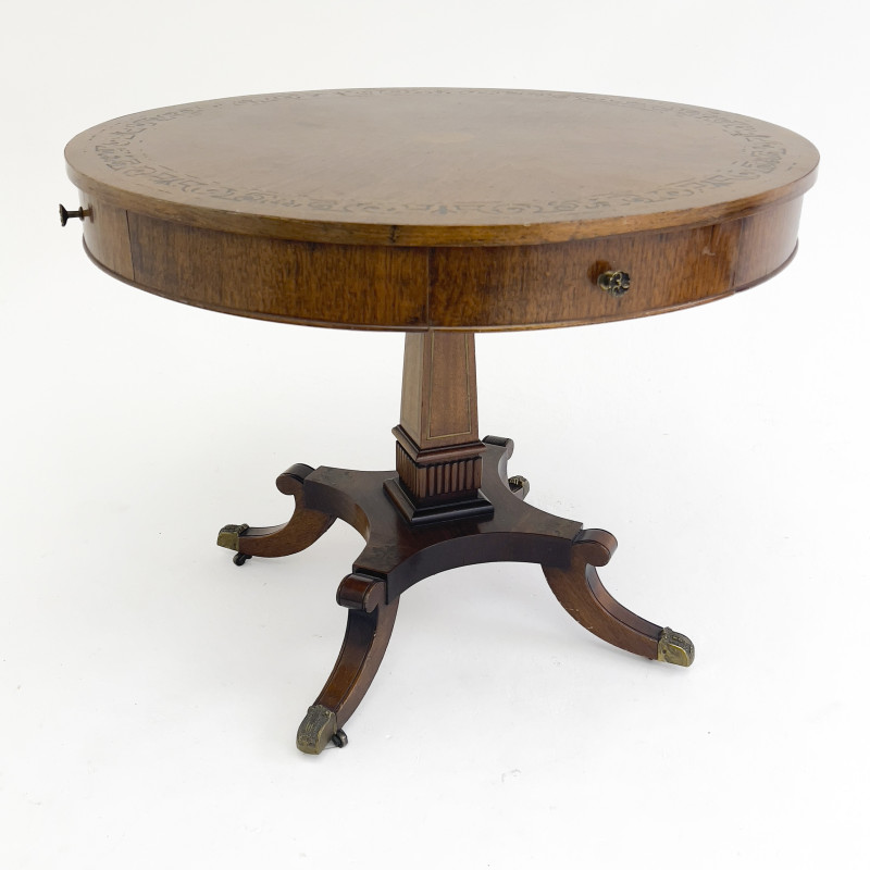 An Antique Regency Style Drum Table