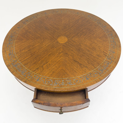 An Antique Regency Style Drum Table