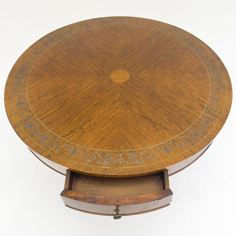 An Antique Regency Style Drum Table