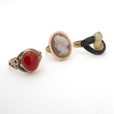 Three Gold Rings Set with Gems