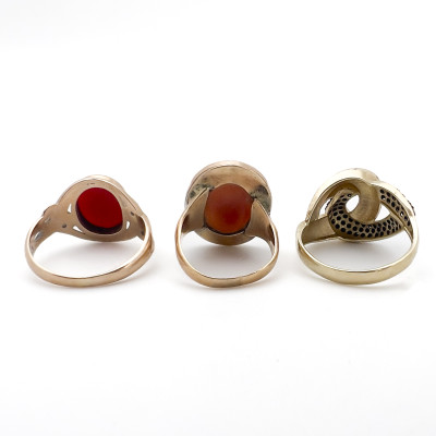 Three Gold Rings Set with Gems