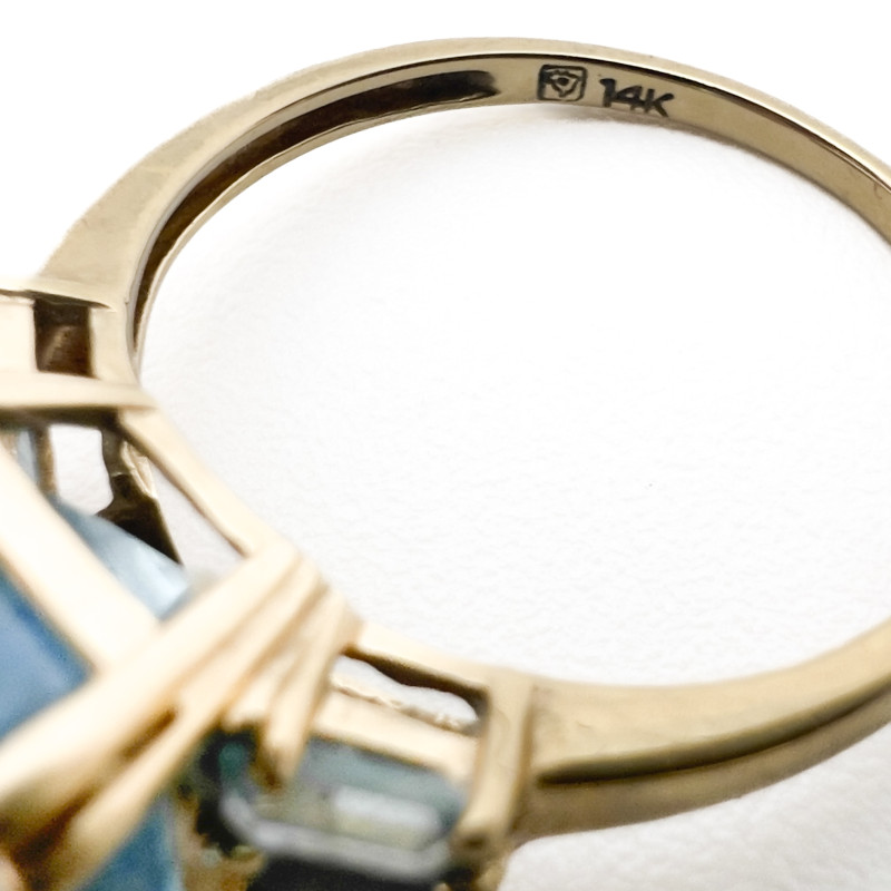 Four Gold Rings With Colorful Gems