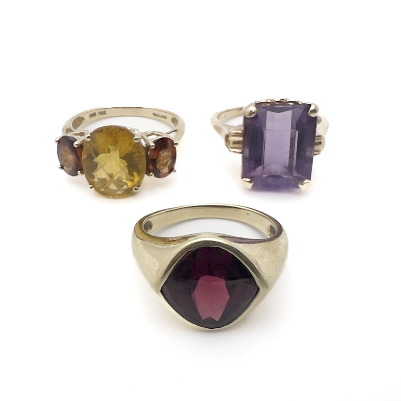 Three Gold Rings With Colorful Gems