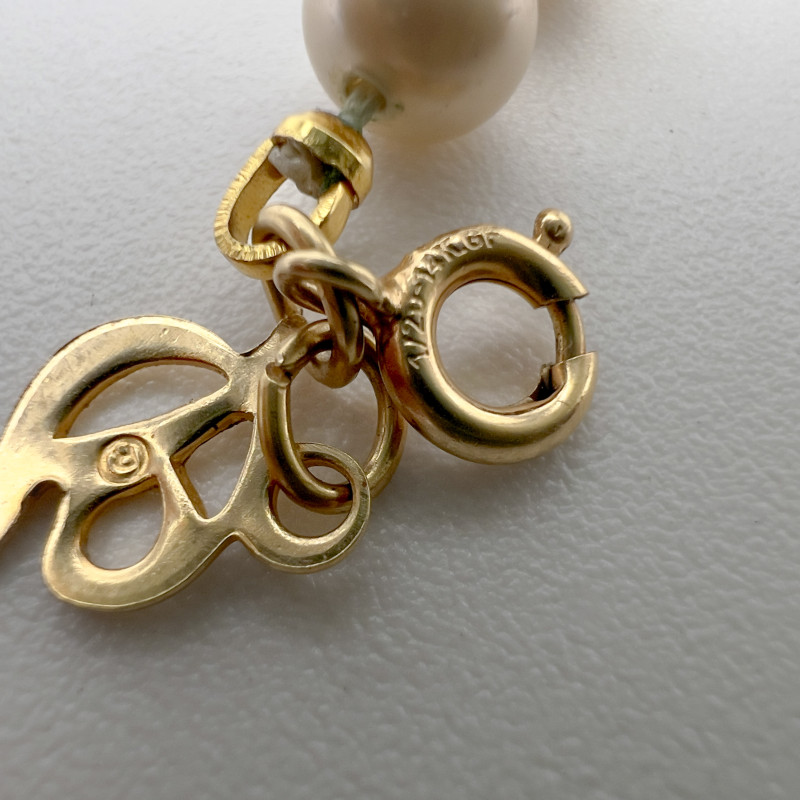 Gold Bracelet and Faux Pearl Bracelet