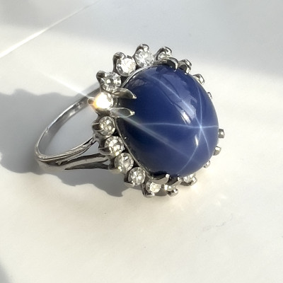 White Gold Ring with Star Sapphire and Diamond Halo