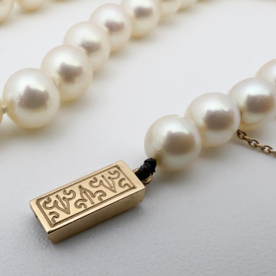 Gold and Graduated Pearl Necklace and Earrings