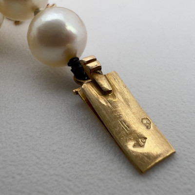Gold and Graduated Pearl Necklace and Earrings
