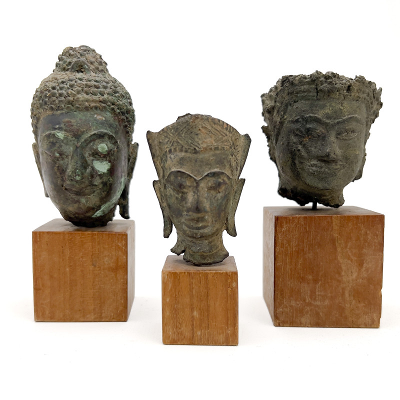 Three Small Buddha Head Fragments Mounted On Stands