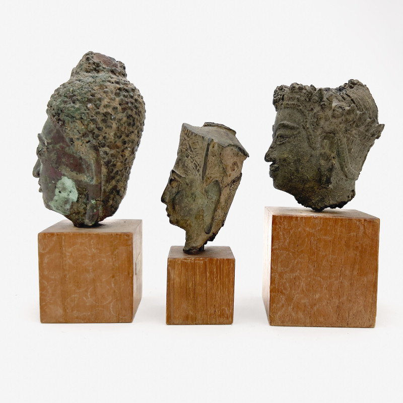 Three Small Buddha Head Fragments Mounted On Stands