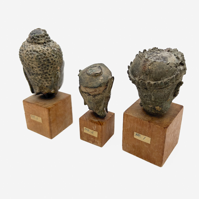 Three Small Buddha Head Fragments Mounted On Stands