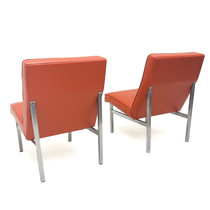 A Pair of Mid-Century Modern Orange Vinyl Slipper Chairs