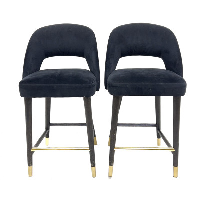 A pair of birch and velvet bar stools
