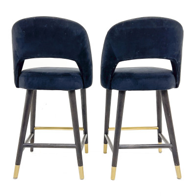 A pair of birch and velvet bar stools