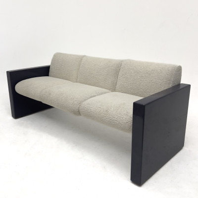 A Contemporary Bouclé Upholstered and Blue Lacquered Sofa
