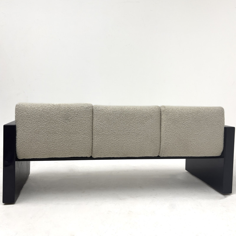 A Contemporary Bouclé Upholstered and Blue Lacquered Sofa