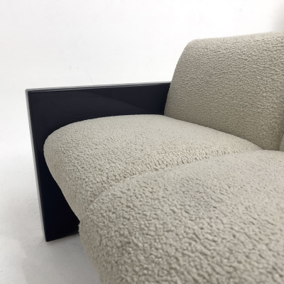 A Contemporary Bouclé Upholstered and Blue Lacquered Sofa