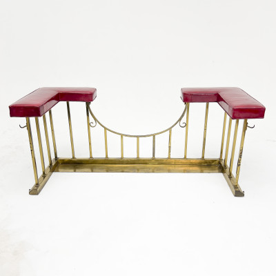 A Neoclassical Style Brass and Leather Club Fireplace Fender