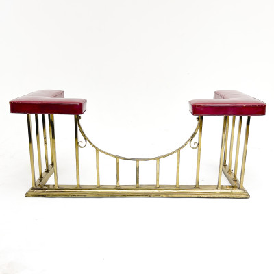 A Neoclassical Style Brass and Leather Club Fireplace Fender