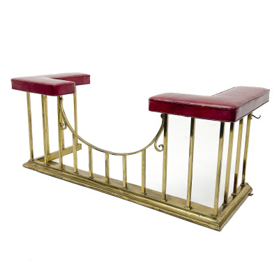 A Neoclassical Style Brass and Leather Club Fireplace Fender