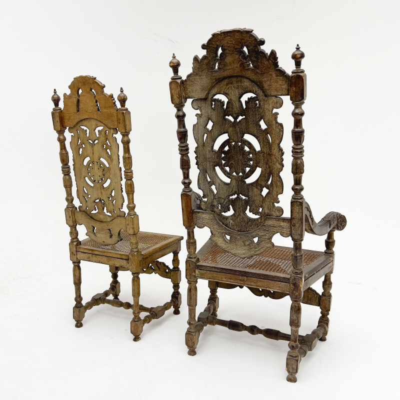 6 carved wood chairs with cane seats